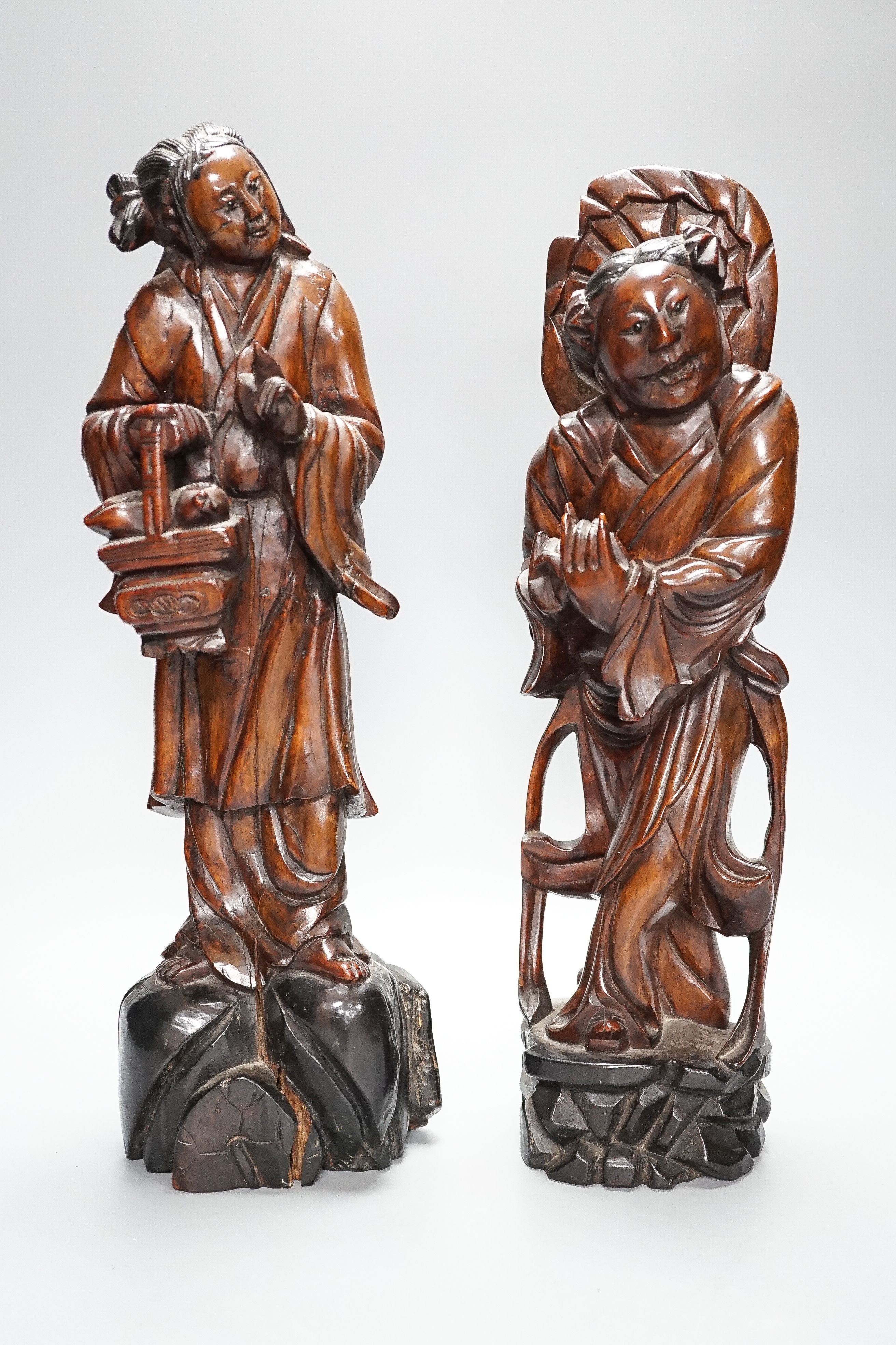 Two early 20th century Chinese carved hardwood figures of ladies 39cm